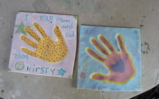 Custom hand painted handprint tiles